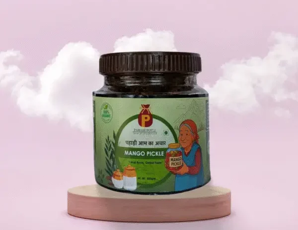 Traditional homemade pahadi mango pickle made using raw mangoes, mustard oil, and authentic Uttarakhand spices. No preservatives, no artificial taste – just pure pahadi flavour.